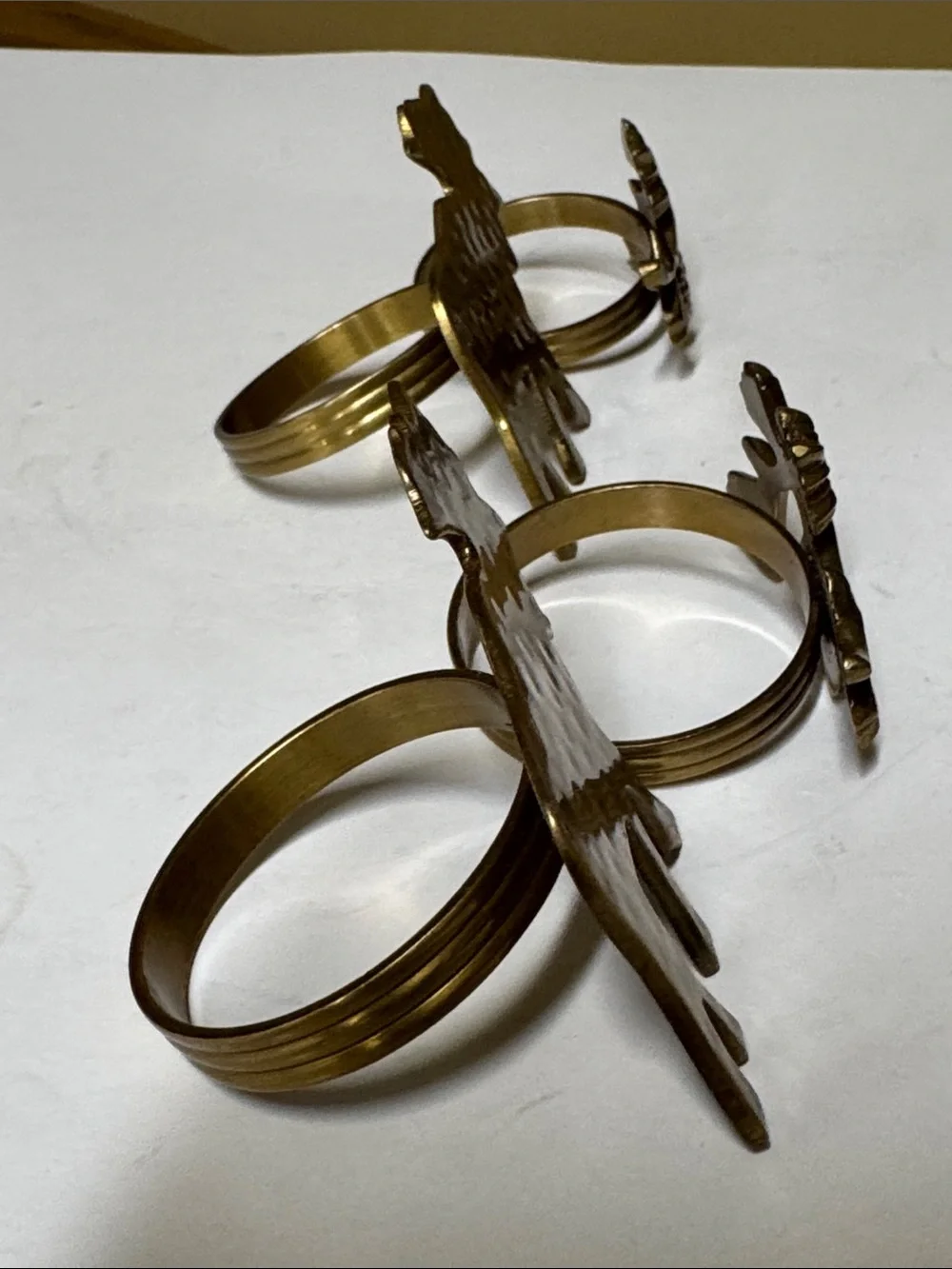 brass moose and pinecone and branch napkin rings set of 4